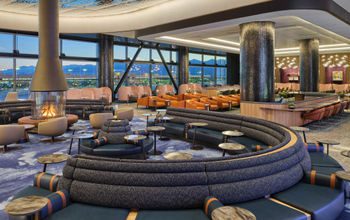 Fireplace and couches in the new Delta Sky Club at Salt Lake City